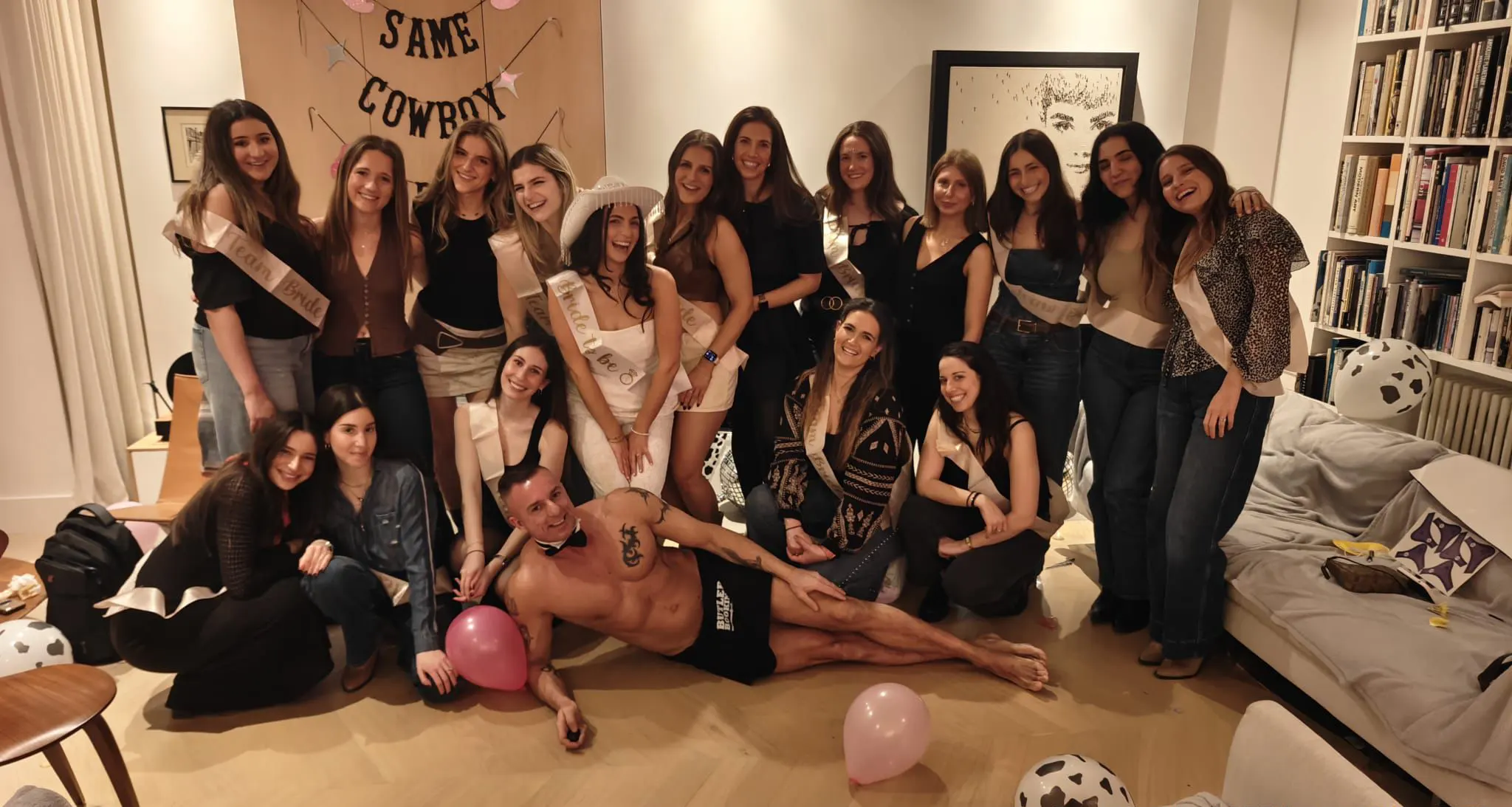 Buff butler serving drinks at a hen party in Bath